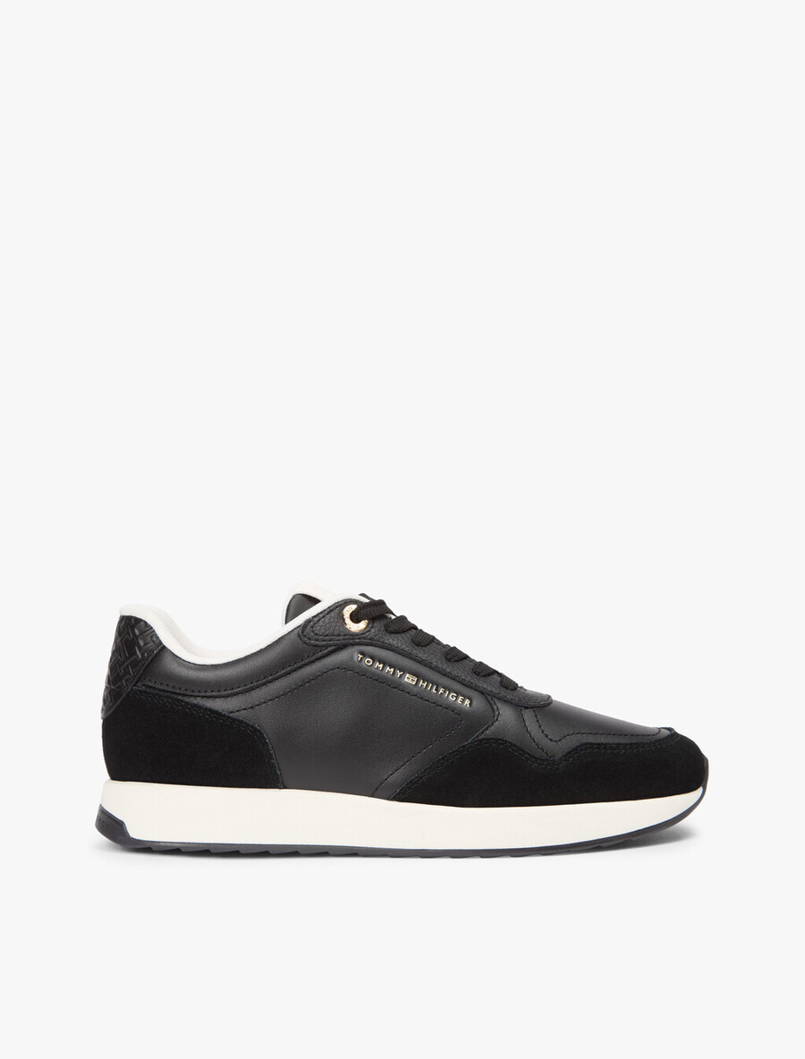 sneakers in pelle con monogramma th in rilievo