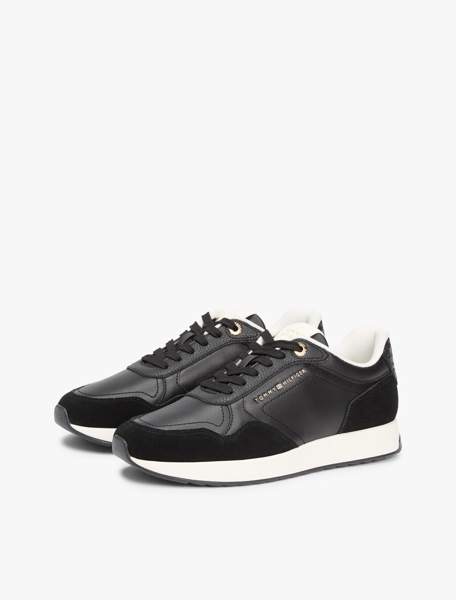 sneakers in pelle con monogramma th in rilievo