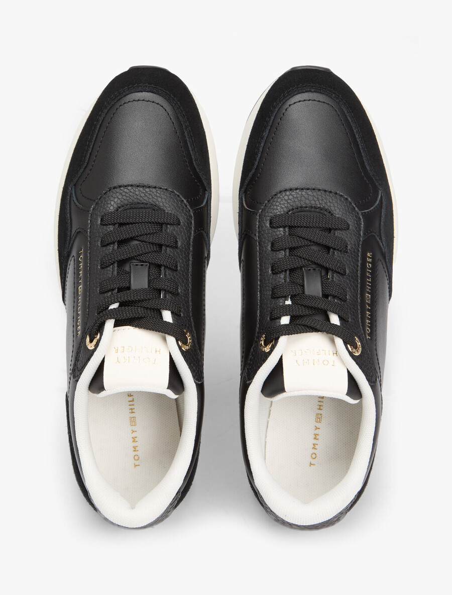 sneakers in pelle con monogramma th in rilievo