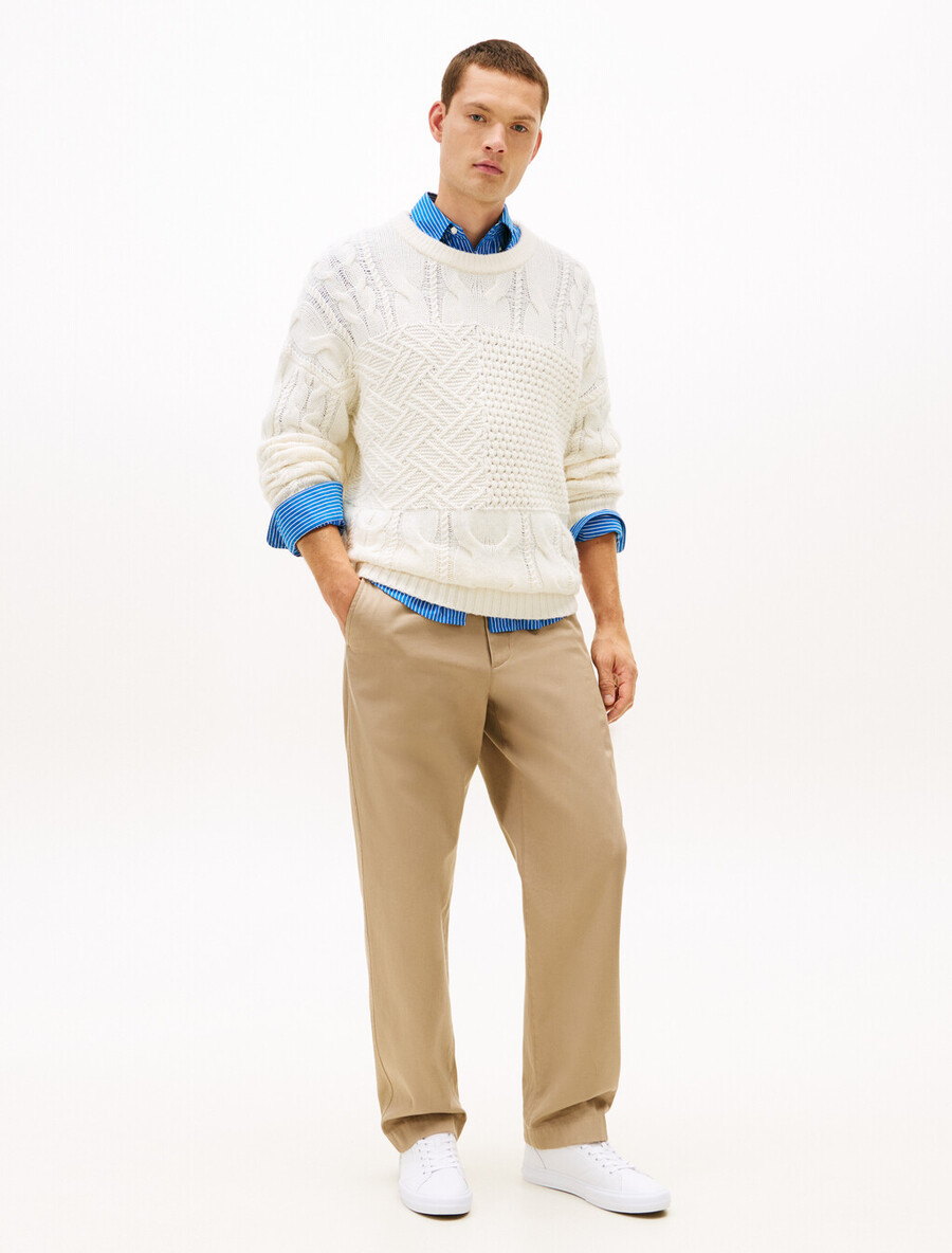 sneakers in pelle con intersuola a contrasto e stampa goffrata