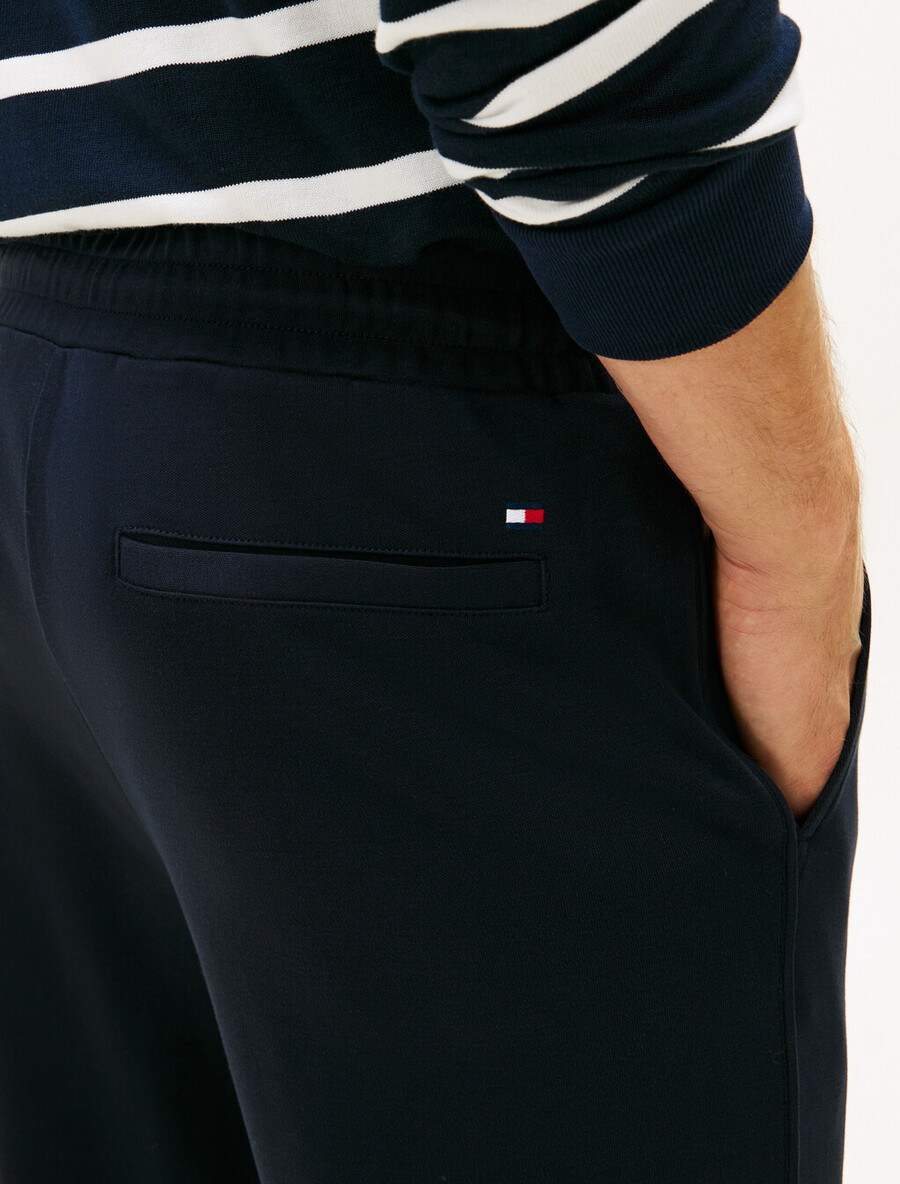 pantaloni della tuta con orlo a coste e monogramma